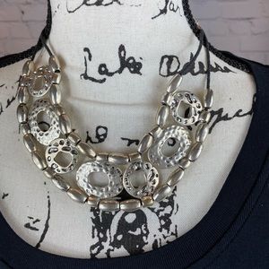 Silver Toned Necklace With Abstract Pieces